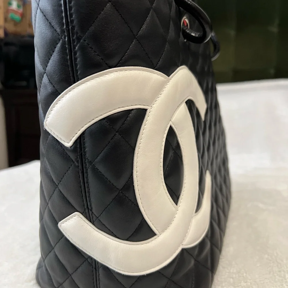CHANEL Black Quilted Leather Shoulder Tote with White CC Emblem
